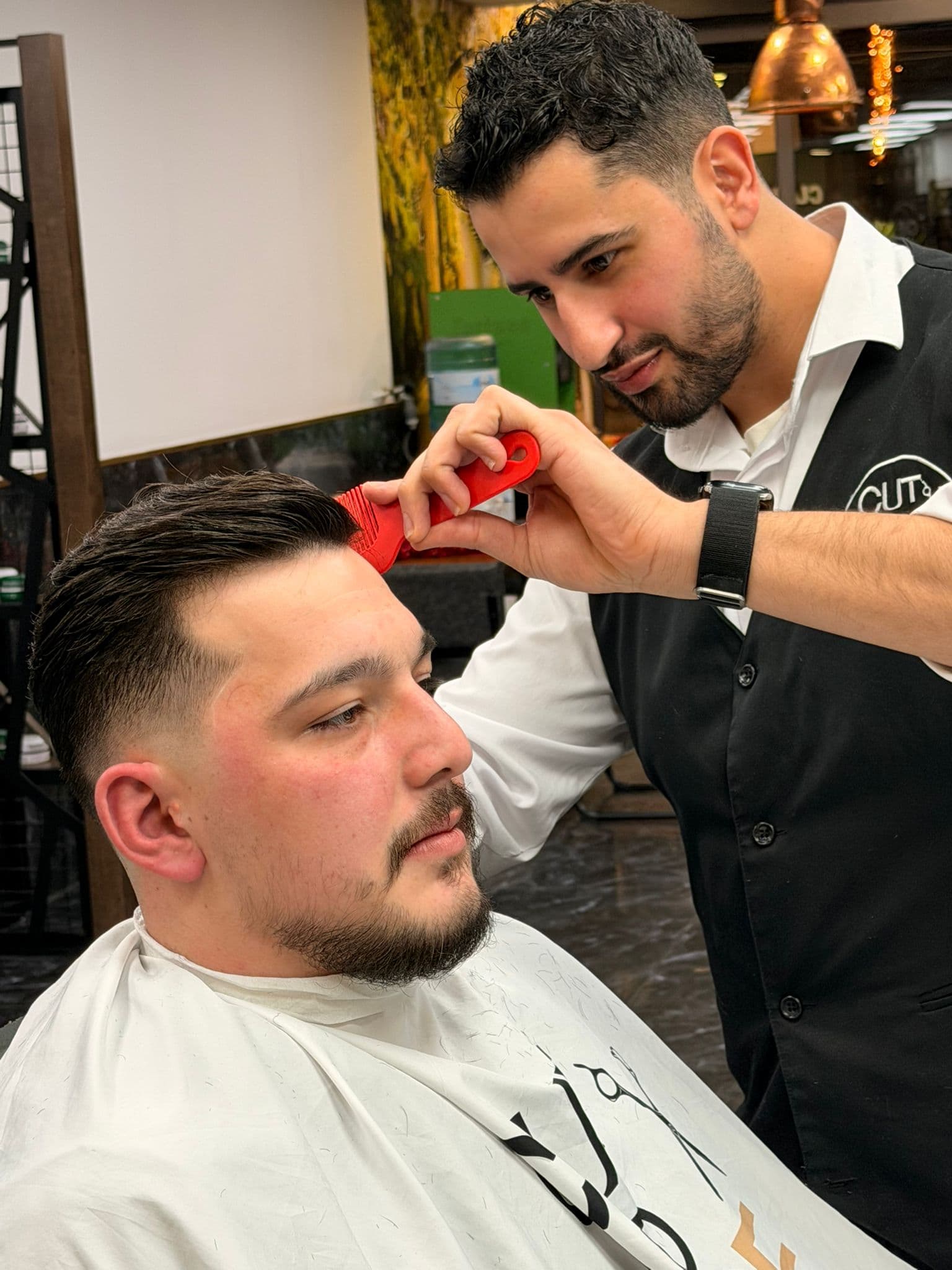 Barber styling a fade at The Fade, Veenendaal